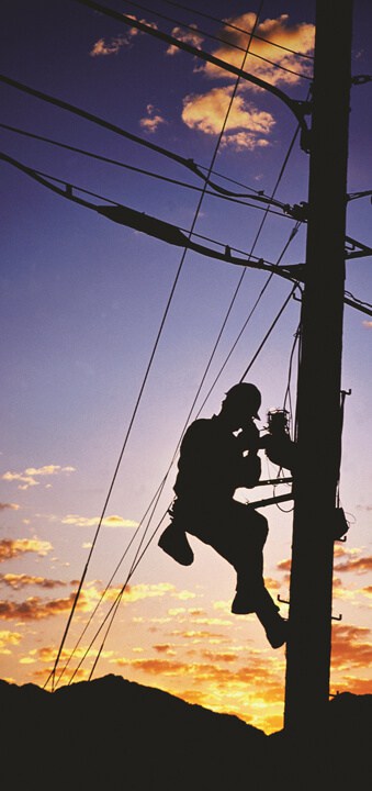 man up pole in sunset