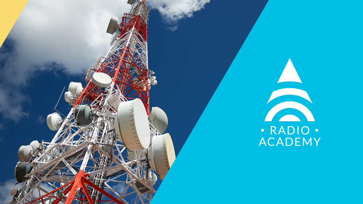 A radio communications tower with Tait Radio Academy Branding
